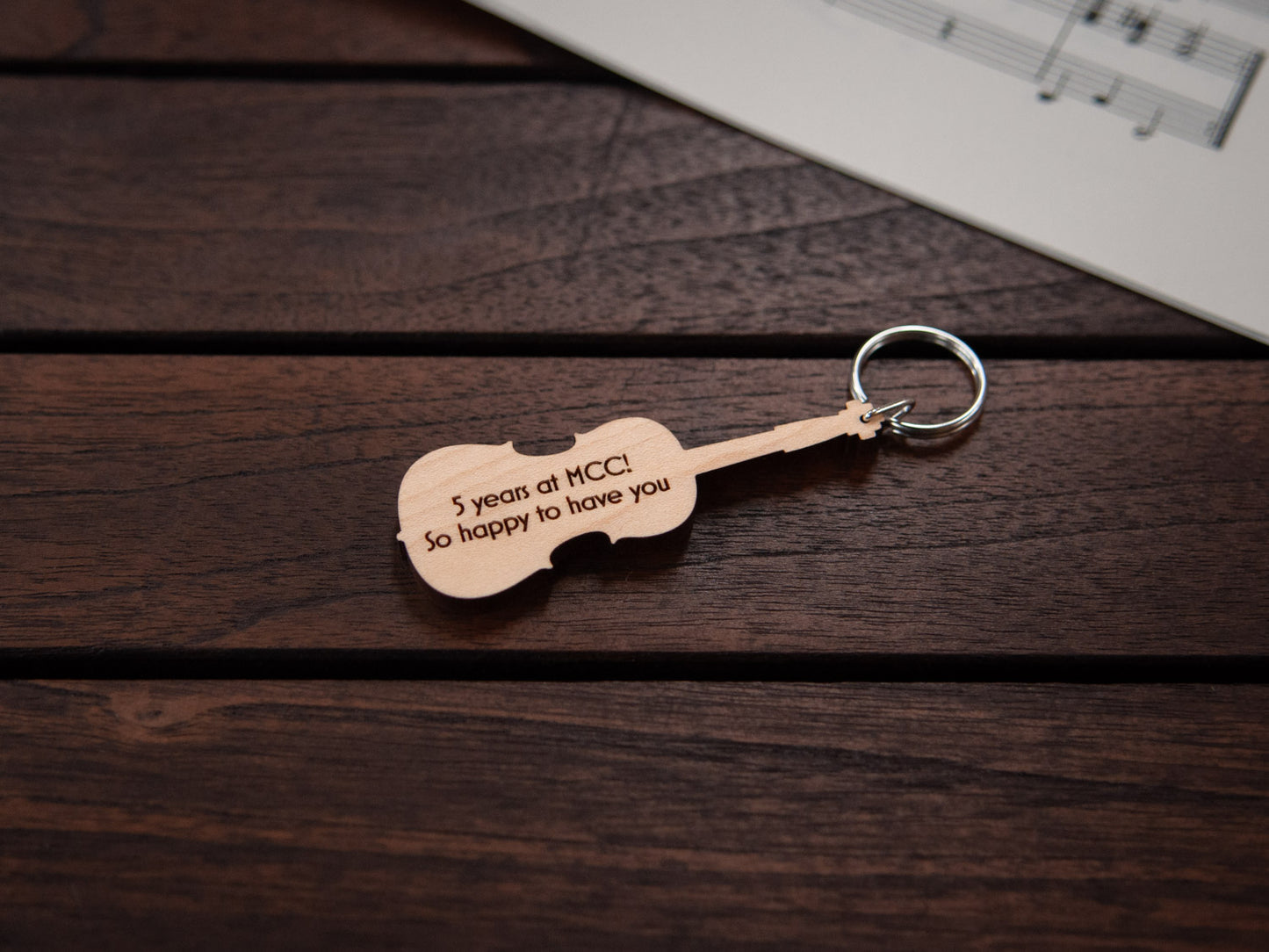 Cello shaped keychain made from maple wood, with personalized engraving