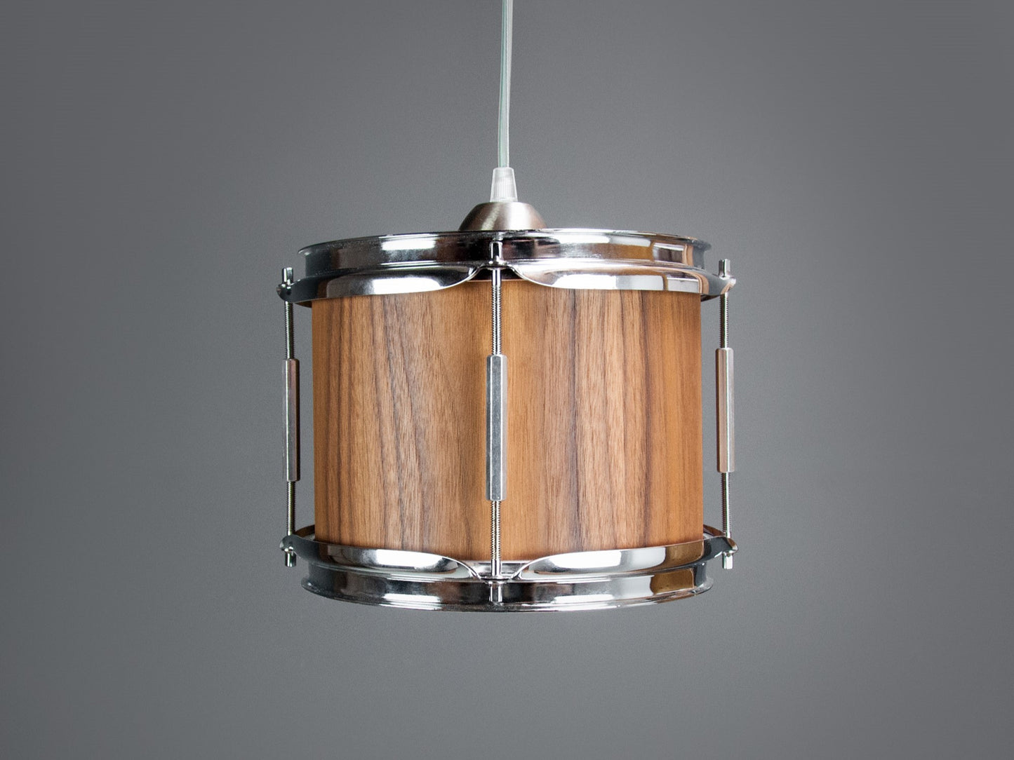 Pendant light made from a drum, finished with a rich walnut veneer