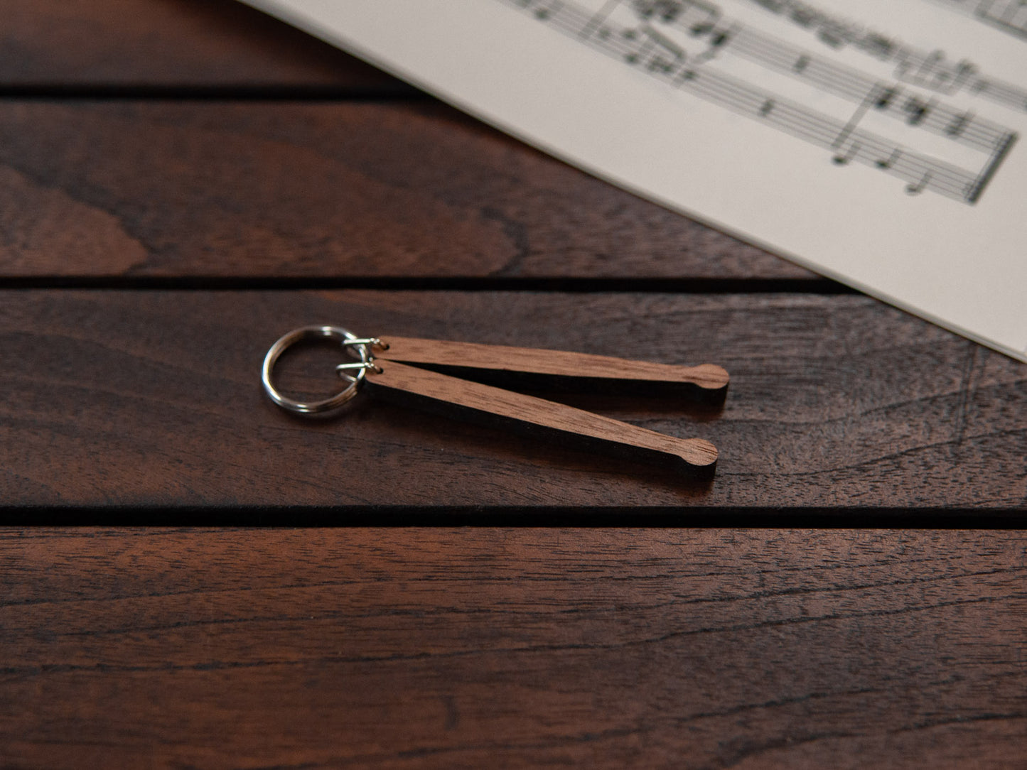 Drumsticks keychain made from walnut wood