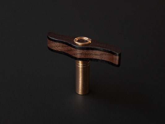 drum key made from walnut and wenge wood with brass details